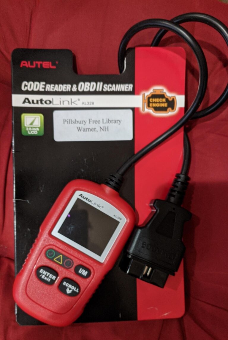 Photo of a red engine code reader and packaging.